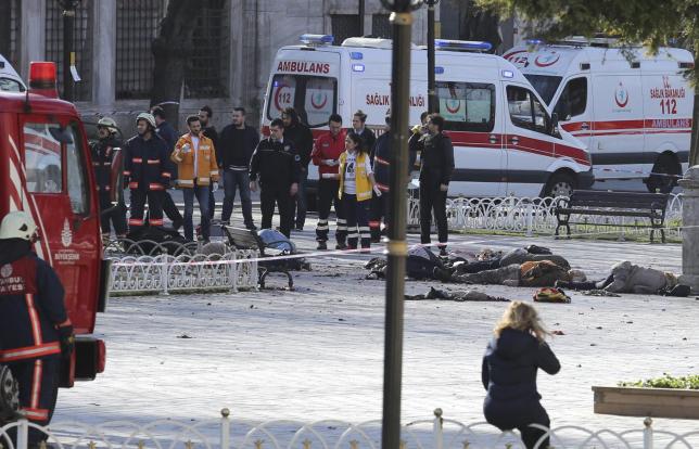 Rescue teams gather at the scene after an explosion in central Istanbul, Turkey January 12, 2016.  REUTERS/Kemal Aslan